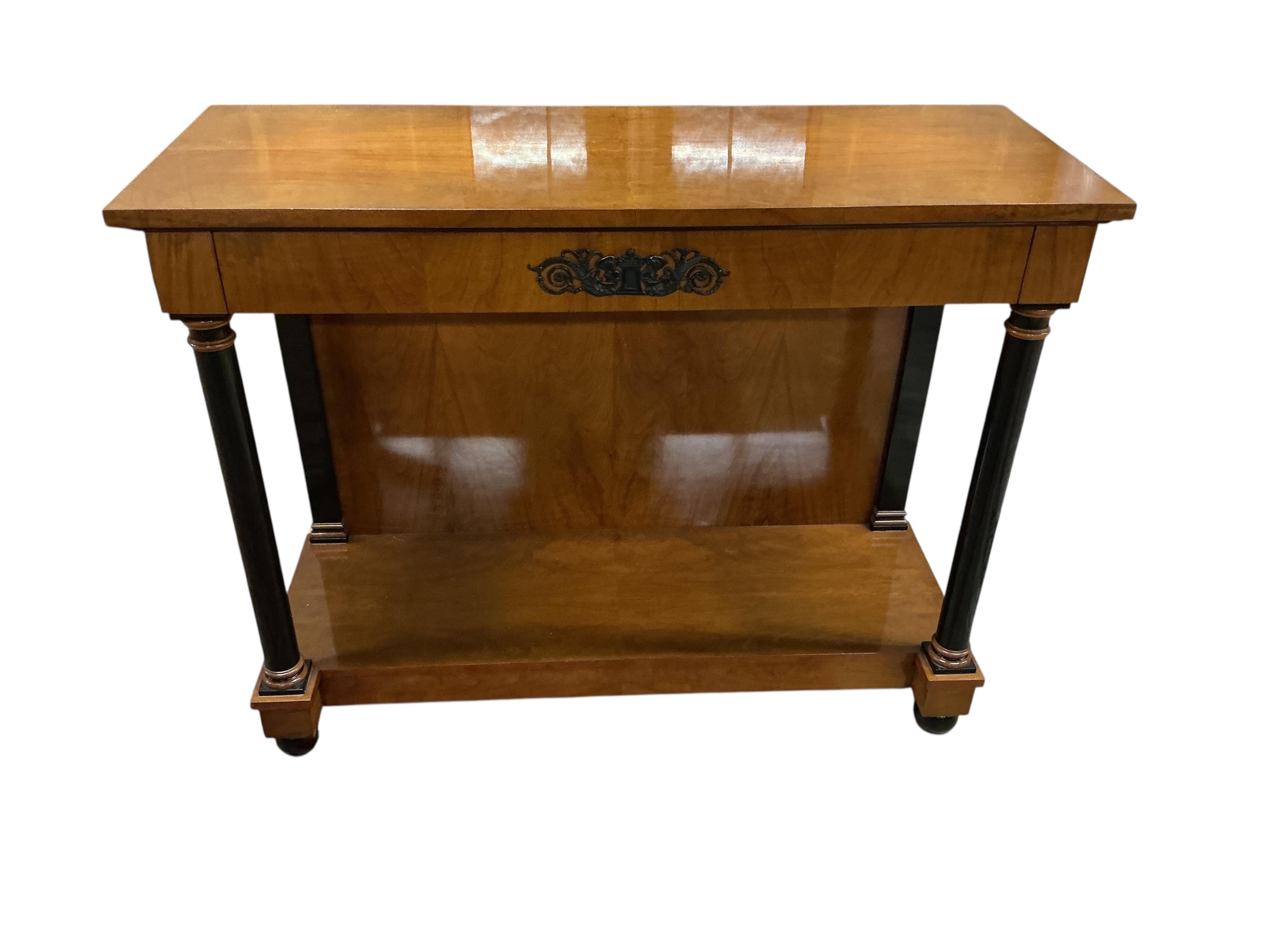 A pair of Biedermeier style cherry two tier console tables, with frieze drawers, width 110cm, depth 42cm, height 86cm